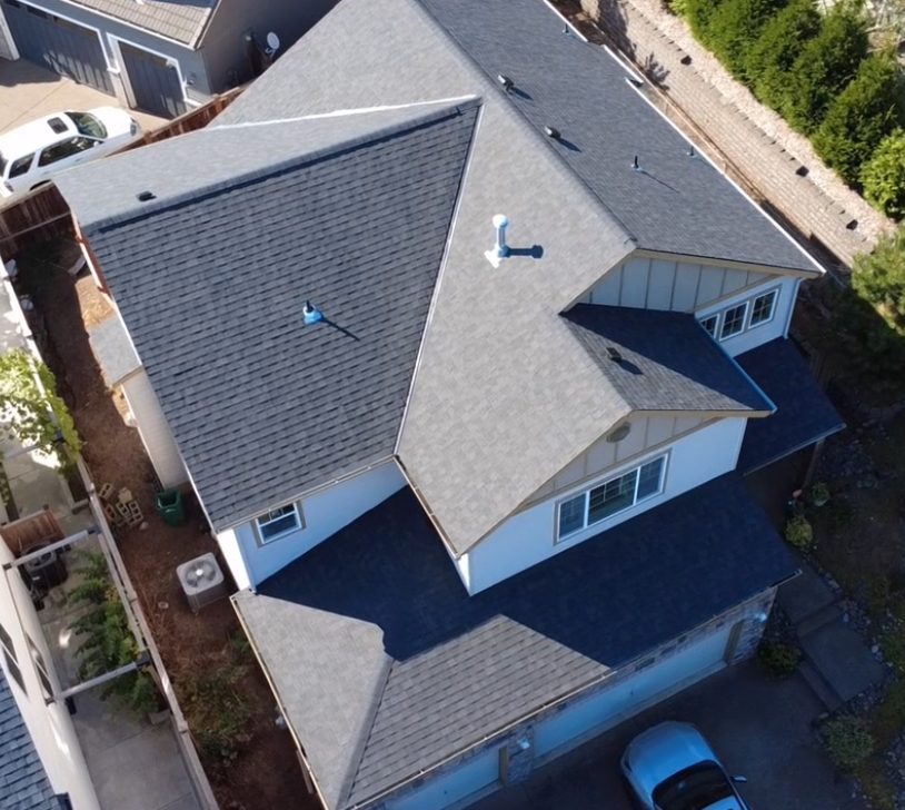 Aerial view of a recently completed roofing project
